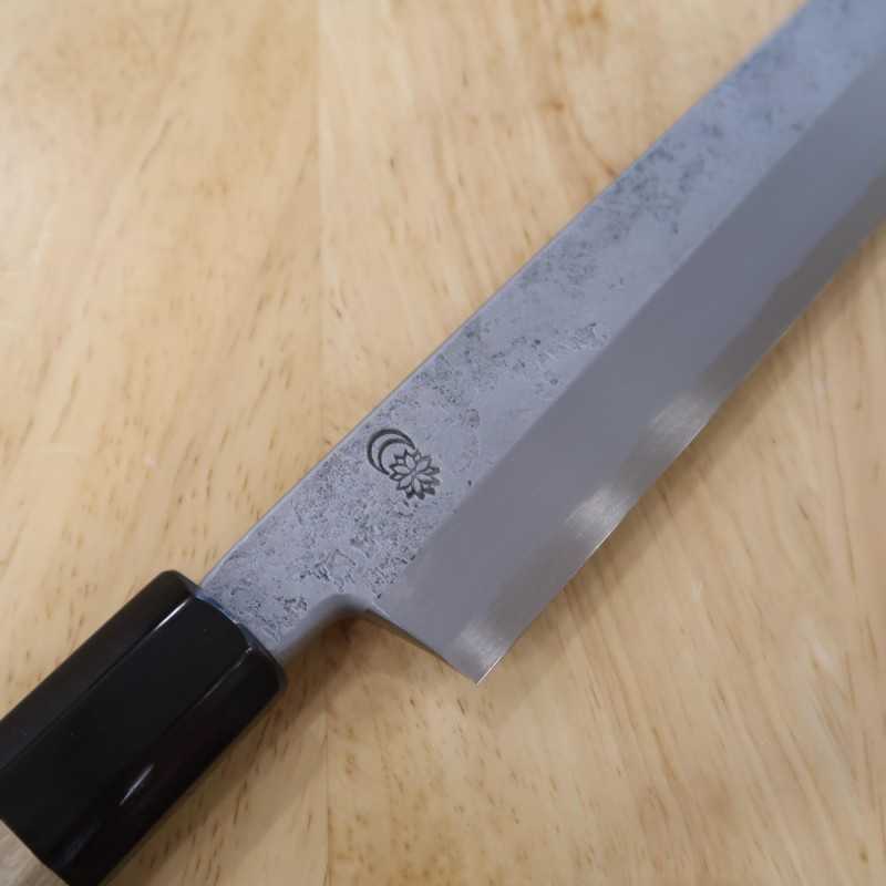 Sakai Kikumori SAKAI KIKUMORI Kikugetsu Nashiji Acier blanc n°2 Yanagiba Manche octogonal en magnolia (270/300mm)