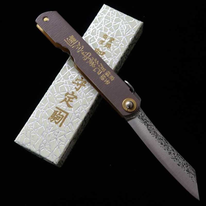 Nagao Kanekoma HIGONOKAMI Higonokami VG10 finition martelée, manche en cuir gris (72mm)