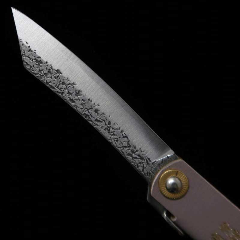 Nagao Kanekoma HIGONOKAMI Higonokami VG10 finition martelée, manche en cuir gris (72mm)