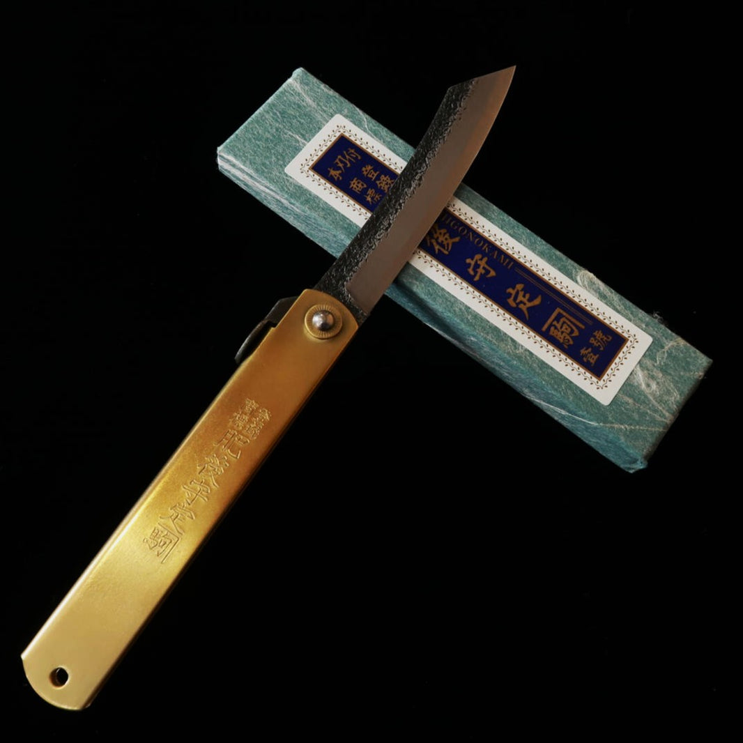 HIGONOKAMI HIGONOKAMI Aogami san-mai, martelada, modelo “Manaka”, dorso preto, extra grande (120 mm)