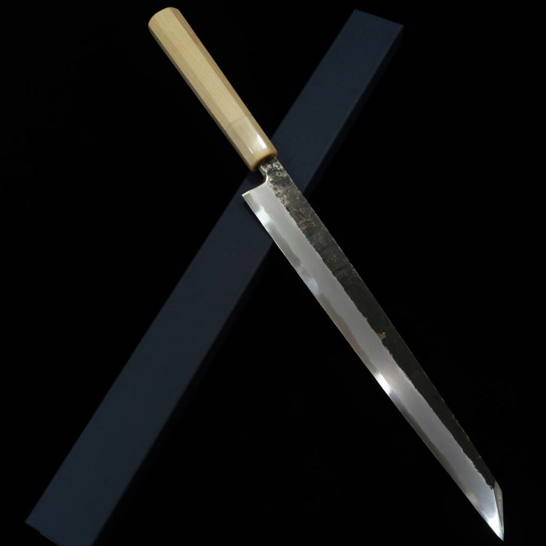 MIURA Itadaki Kirituke Yanagiba Aço Shirogami nº 2 Acabamento Kurouchi Cabo octogonal de búfalo branco (270/300mm)