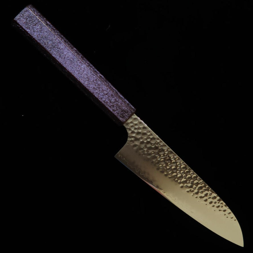 Sekikanetsugu SEIKANETSUGU Shiun SHIUN Santoku VG10, martelada, cabo octogonal em carvalho laqueado roxo “Monmurasaki” (170 mm)