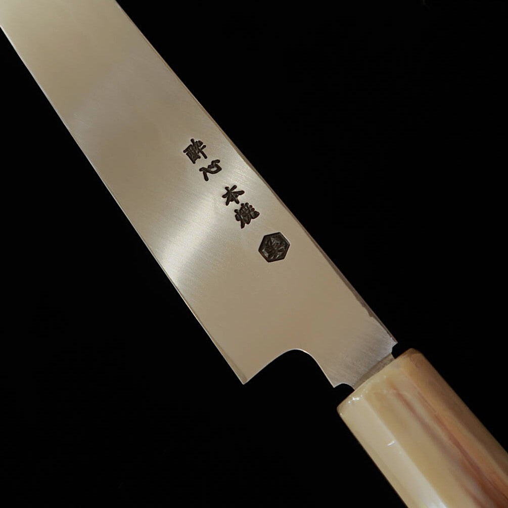 SUISIN – Œuvre de Miwa Ikeda – Acier blanc n°3, Tako-hiki à pointe arrondie, trempe intégrale, manche octogonal en ébène, fourreau en bois de houx (300 mm)