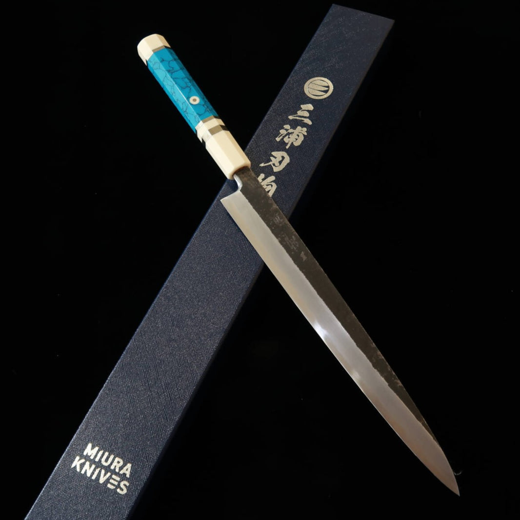 Miura Itadaki MIURA Itadaki Tanaka Giichi yanagiba Shirogami #2, acabamento negro forjado, cabo em turquesa branca (270 mm)