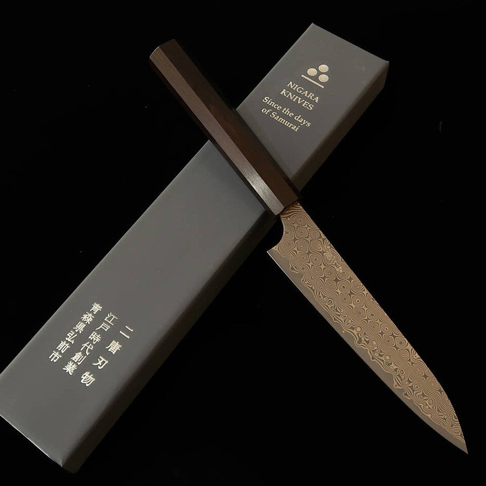 Nigara Hamono Anmon Petty SG2, cabo octogonal integral de ébano (150 mm)